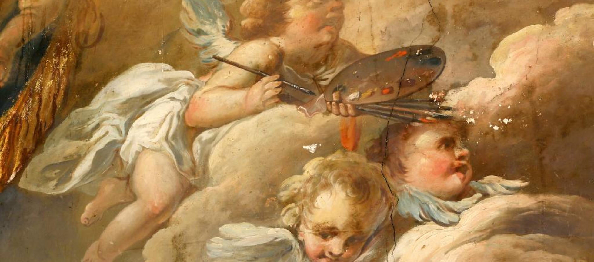 Détail des décors, angelot à la palette de peintre avec pinceaux